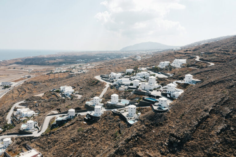 Joyful Santorini wedding journey with guests at Le Cote venue
