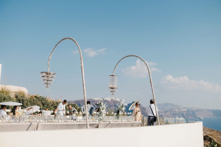 Joyful Santorini wedding journey with guests at Le Cote venue