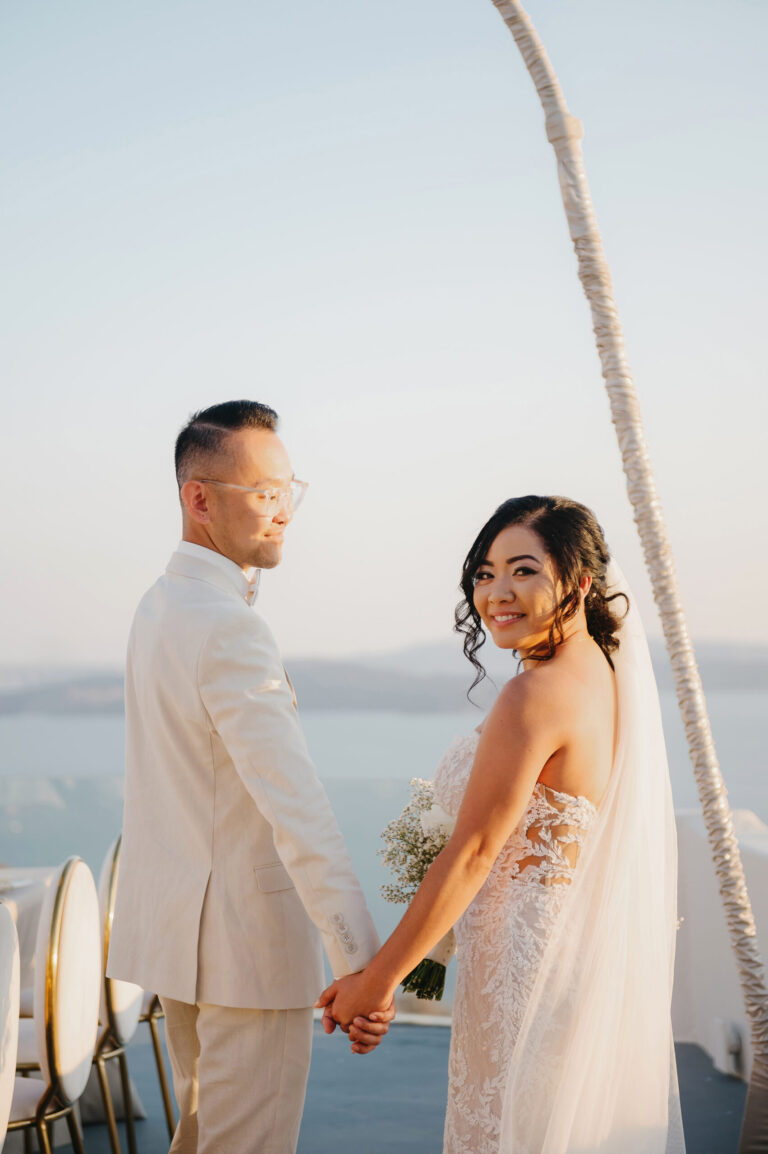 Joyful Santorini wedding journey with guests at Le Cote venue