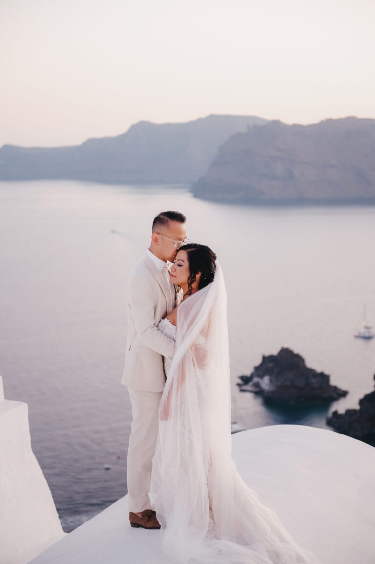 Joyful Santorini wedding journey with guests at Le Cote venue