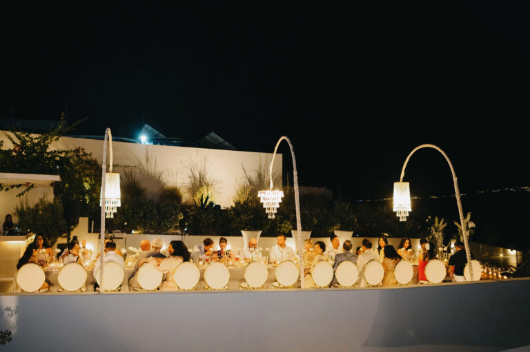 Joyful Santorini wedding journey with guests at Le Cote venue