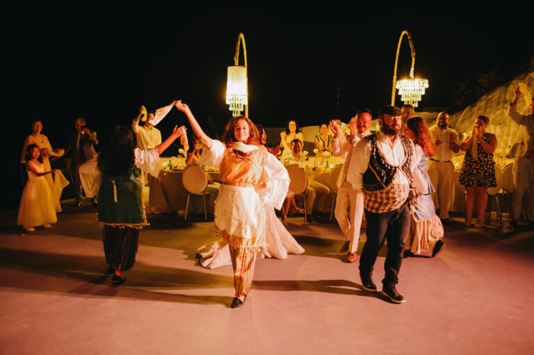 Joyful Santorini wedding journey with guests at Le Cote venue