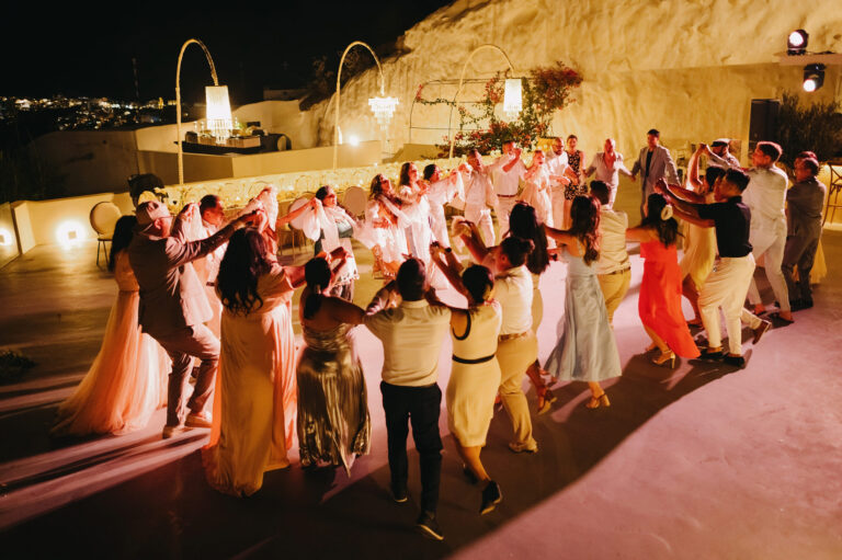 Joyful Santorini wedding journey with guests at Le Cote venue