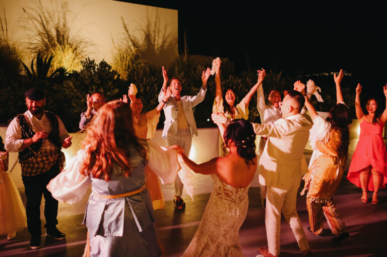 Joyful Santorini wedding journey with guests at Le Cote venue