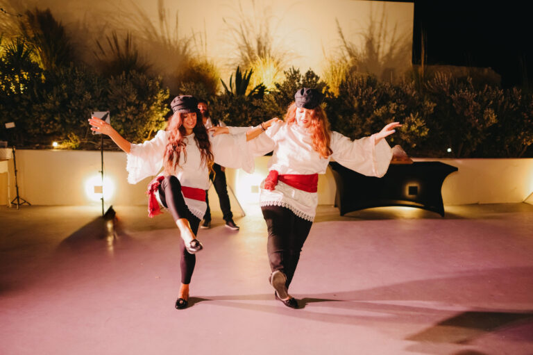 Joyful Santorini wedding journey with guests at Le Cote venue