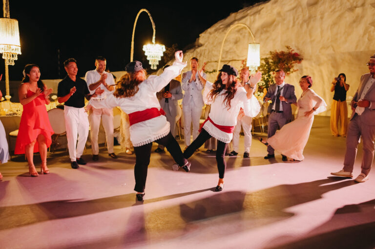 Joyful Santorini wedding journey with guests at Le Cote venue