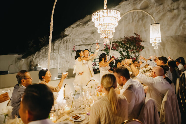 Joyful Santorini wedding journey with guests at Le Cote venue