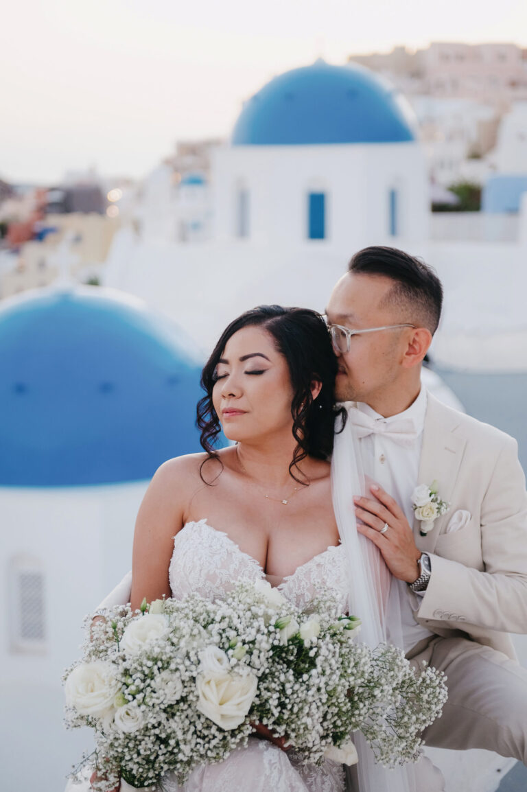 Joyful Santorini wedding journey with guests at Le Cote venue