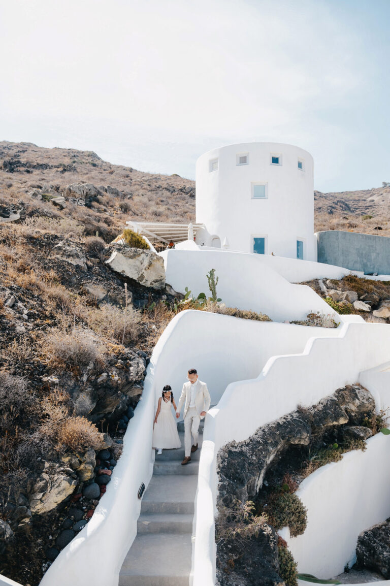 Joyful Santorini wedding journey with guests at Le Cote venue